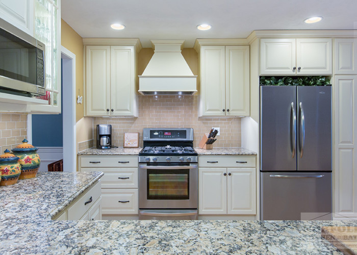 Linen finish kitchen at stove with painted hood