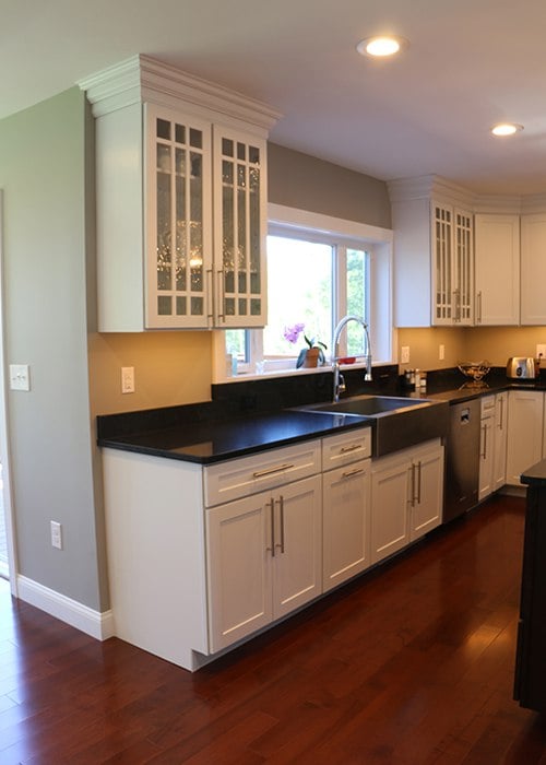 White Kitchen Featuring Dark Cherry Island