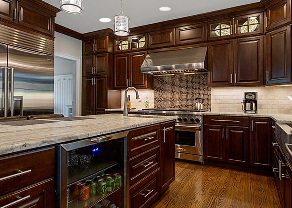 Cherry Kitchen with medium toned hardwood flooring