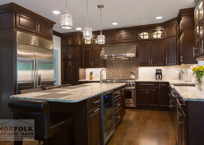 Cherry Kitchen with large stainless fridge