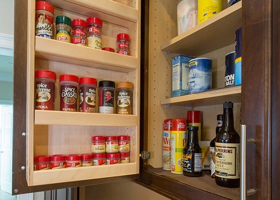 Cherry cabinets with spice rack doors