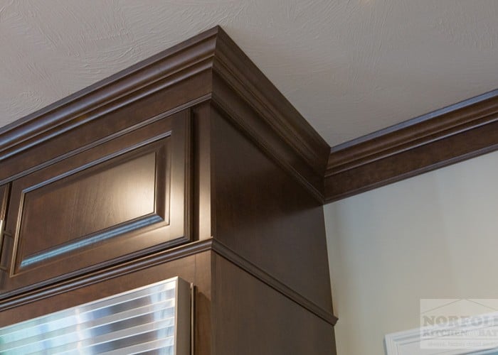 Cherry crown moulding to ceiling