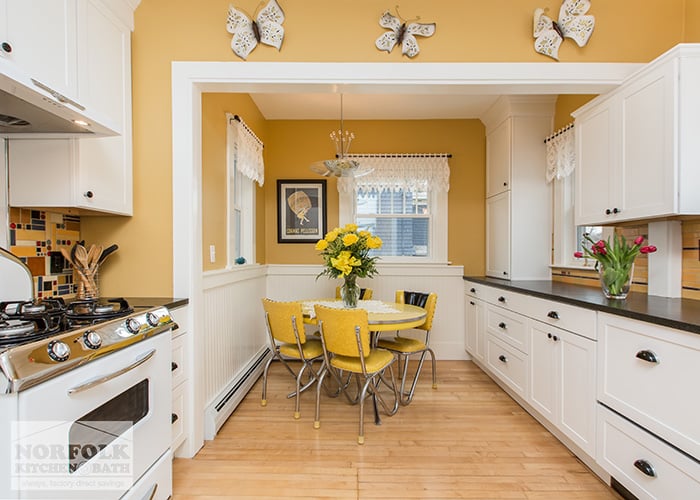 White Kitchen with bright yellow kitchen table