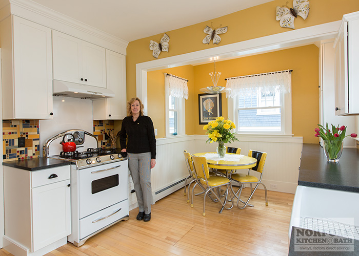 Woman customer standing in kitchen