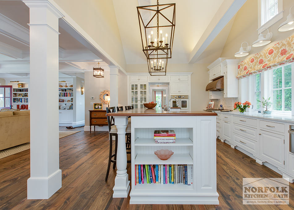 end view of book shelf in beautiful white kitchen