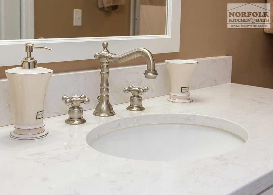 undermount china lav bowl on white marble granite top and brushed chrome faucet