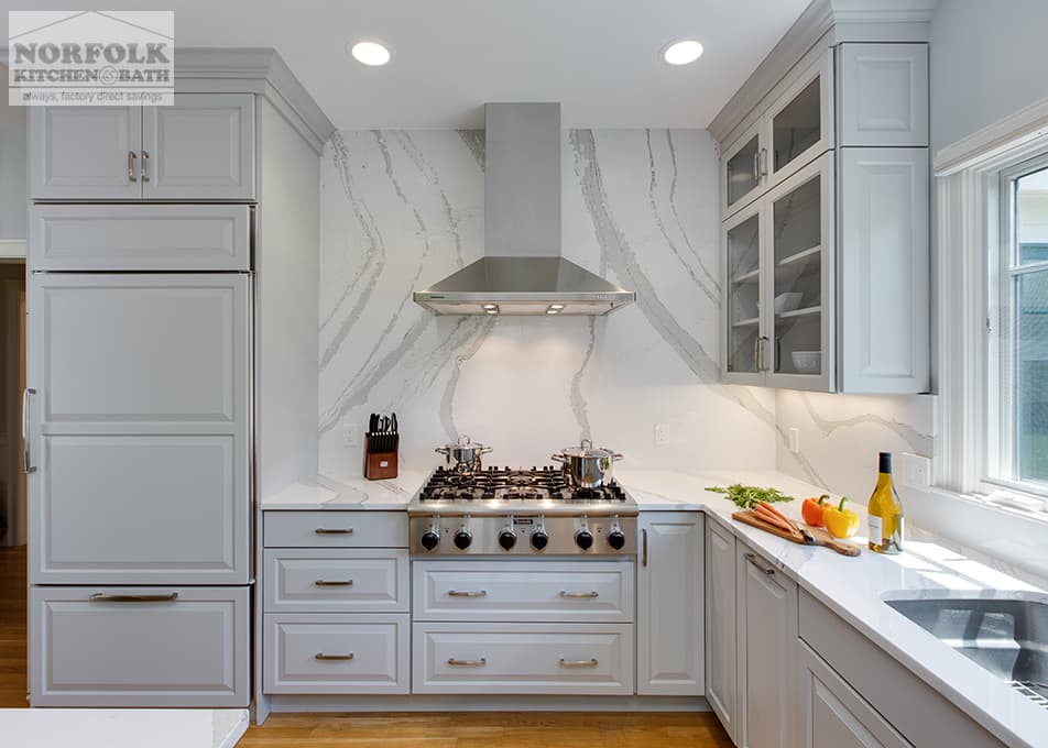 cambria quartz brittanicca countertop behind stainless hood at cooktop