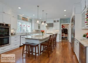 Oversized white kitchen island with seating