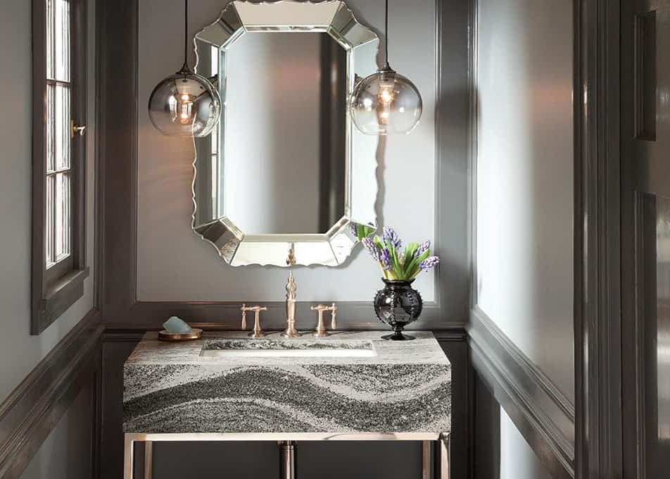 a bold cambria quartz vanity countertop with a thick edge profile in a modern bathroom