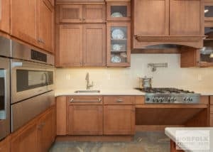 ADA compliant kitchen with wheelchair apron under cooktop