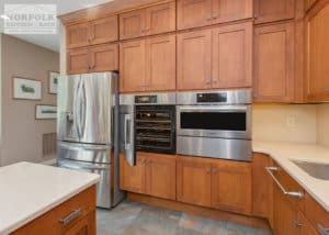 ADA compliant kitchen showing stainless steel appliances