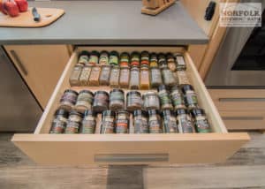 kitchen drawer filled with spice storage