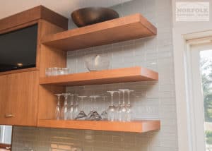 flight wood color thick floating shelves that match cabinets