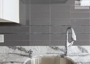 Grey glass backsplash tiles