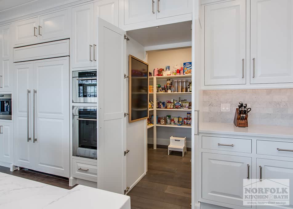 white kitchen cabinets with hidden pantry