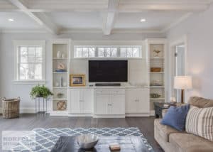 living room with custom white entertainment center