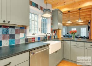 patchwork looking handmade ceramic kitchen backsplash