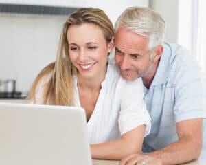 Couple looking at Laptop