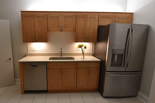 kitchen remodel with new cabinets, countertops and appliances at the Pine Street Inn Yearwood House in Boston, MA