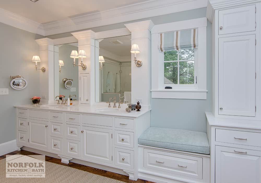 double sink white vanity with built in seat and decorative moldings
