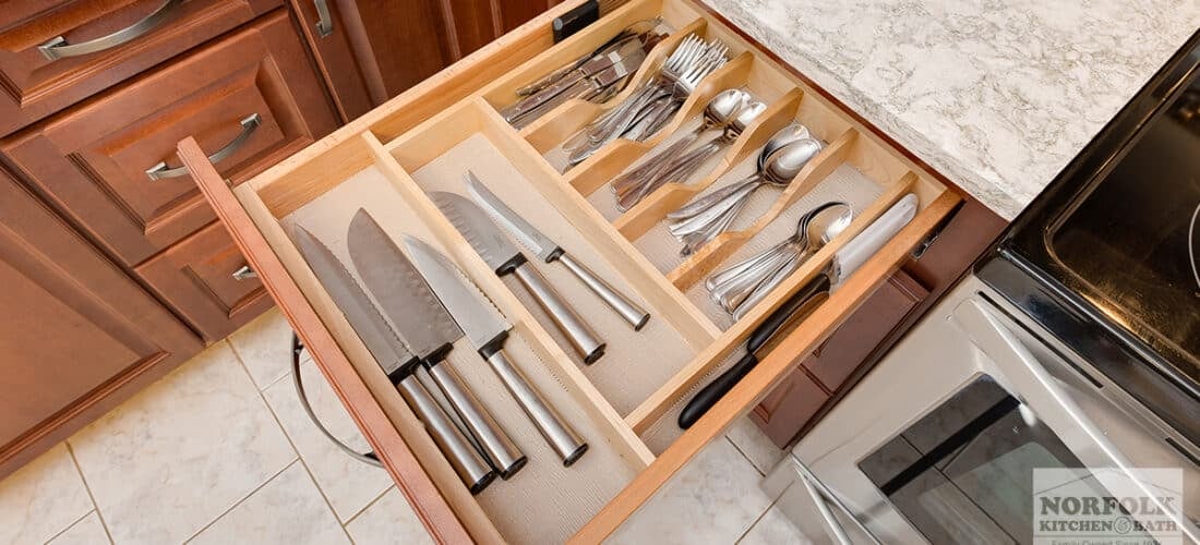 a kitchen cabinet upgrade with a built-in cutlery drawer