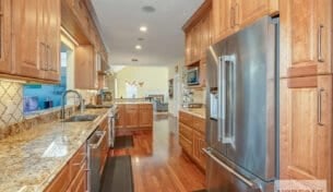 Traditional Natural Cherry Kitchen in Needham