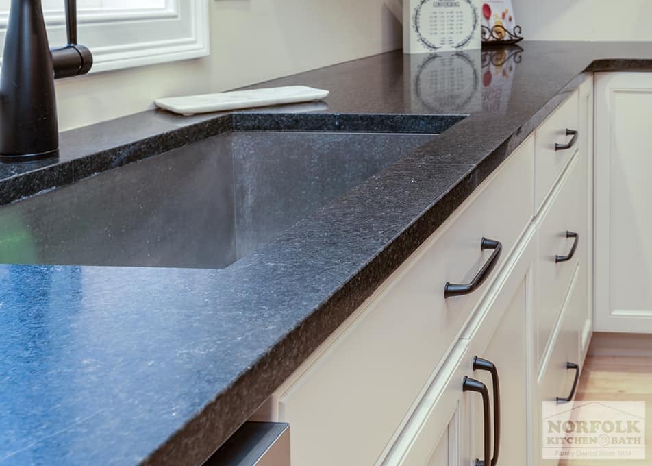 close up of the sink and stone countertop in a Hudson kitchen remodel