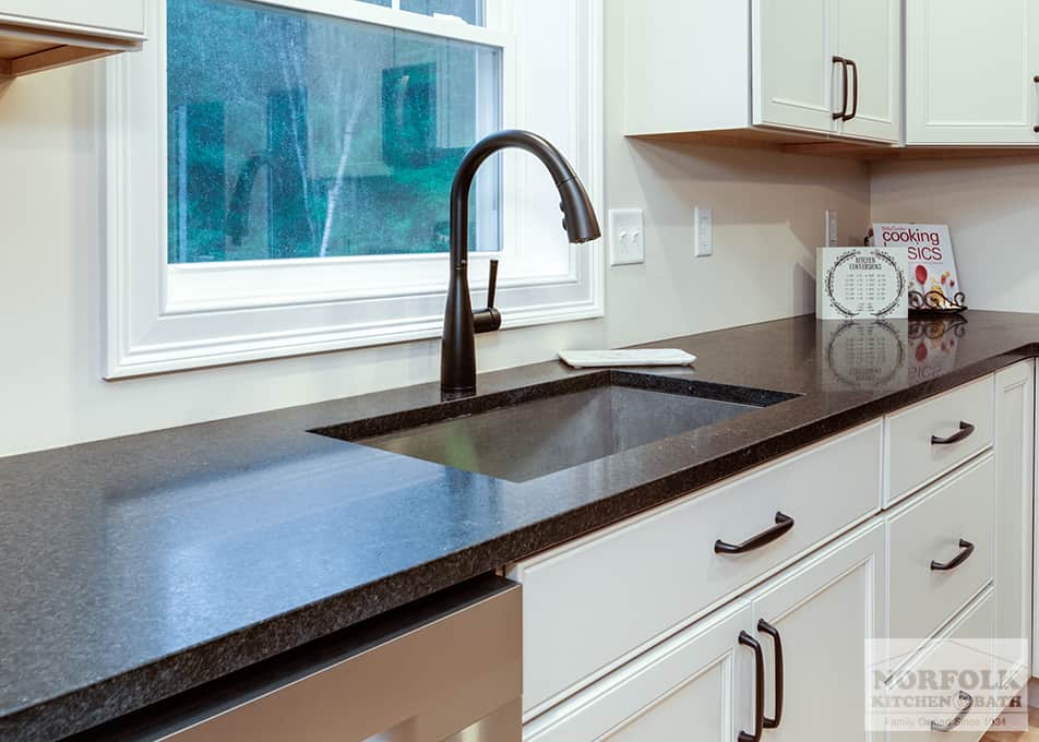 close up of stone countertops and kitchen sink in a Hudson NH kitchen remodel