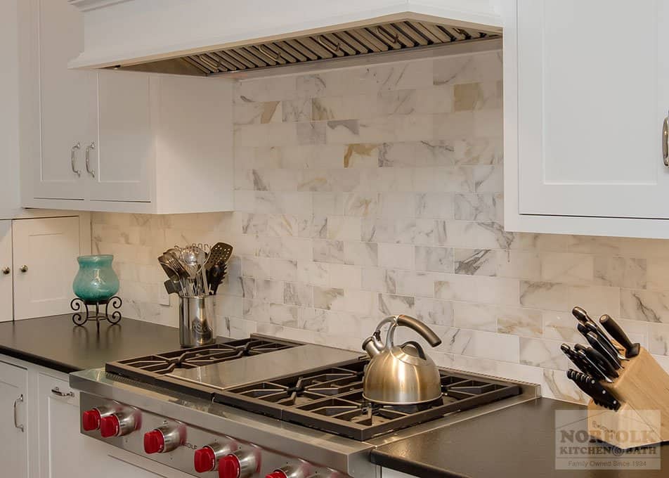 marble tile in a white kitchen remodel