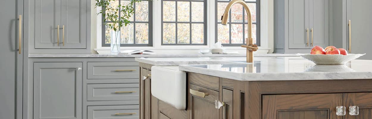 two tone kitchen with decorative cabinet hardware